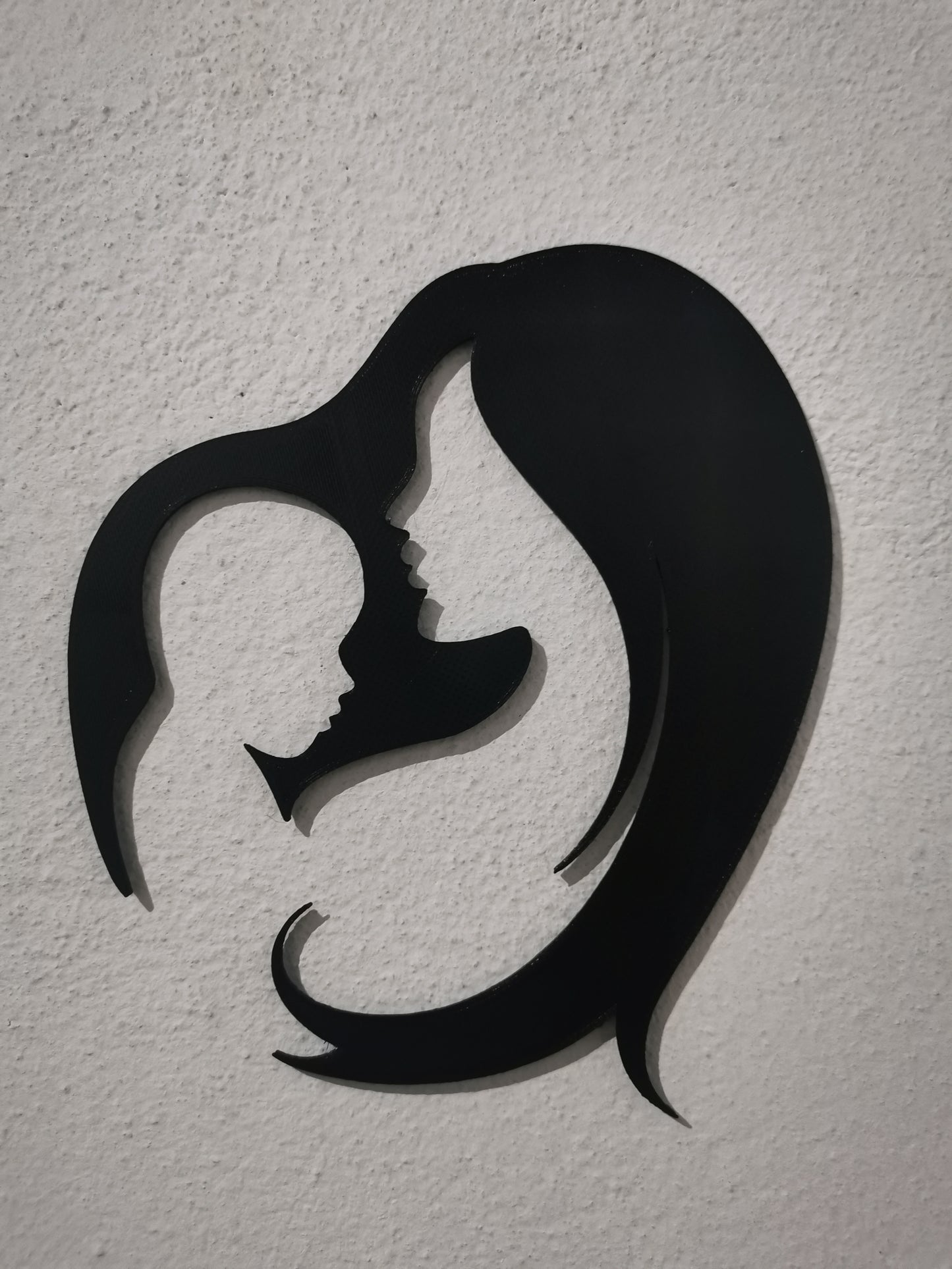 Silueta madre con su hijo